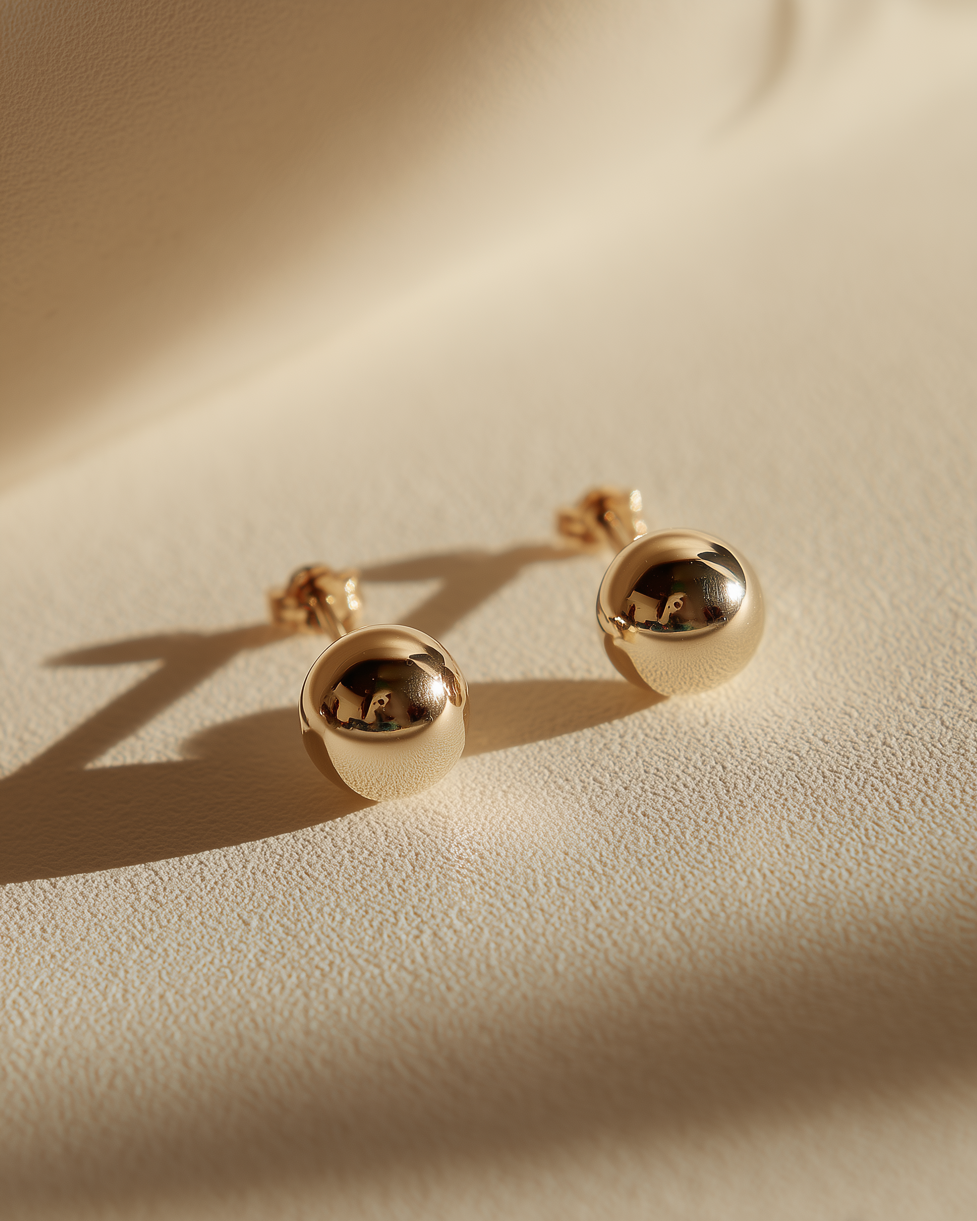 Tiny solid 14k gold stud earrings
